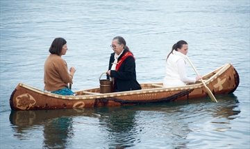  From left: Meredith Brown, Linda Manitowabi, and Kelly Cooley, rowing a canoe in the waters of the Niagara River outside Niagara-on-the-Lake's Fort George Historic Site Navy Hall. This is part of the launch of the Biinaagami Project, focused on preserving the Great Lakes for future generations. Manitowabi is returning some water used in a traditional water ceremony back to the river.